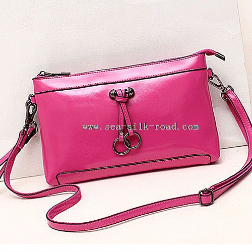leather lady ring clutch bag
