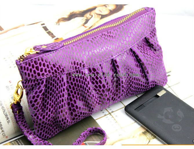 snake leather clutch