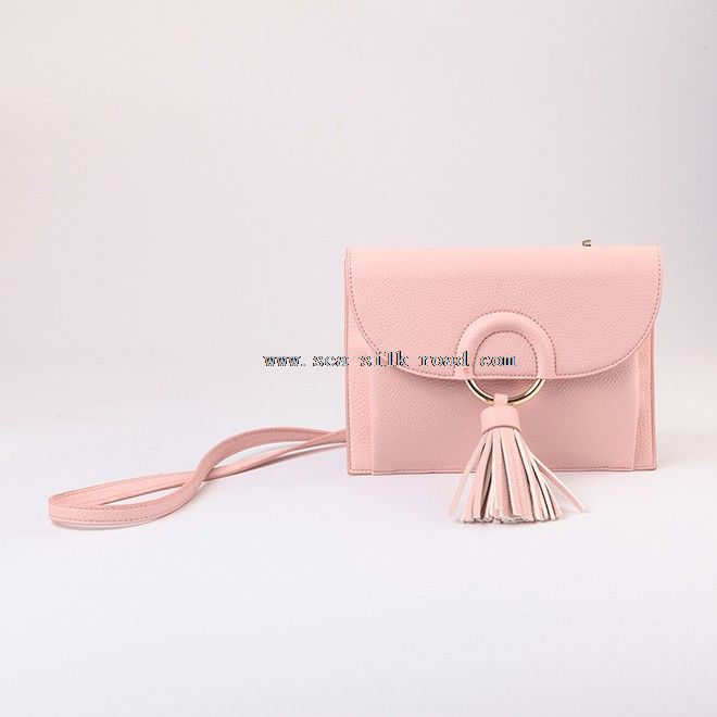 handbag with decorative tassel