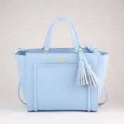 bolso de mano con borla decorativa images