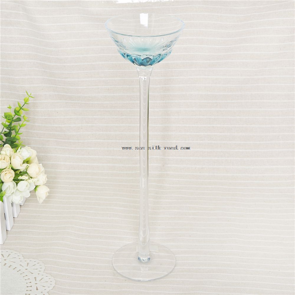 Long-stemmed vintage glass candle holder