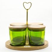 vetro verde candela vaso con il coperchio in legno images