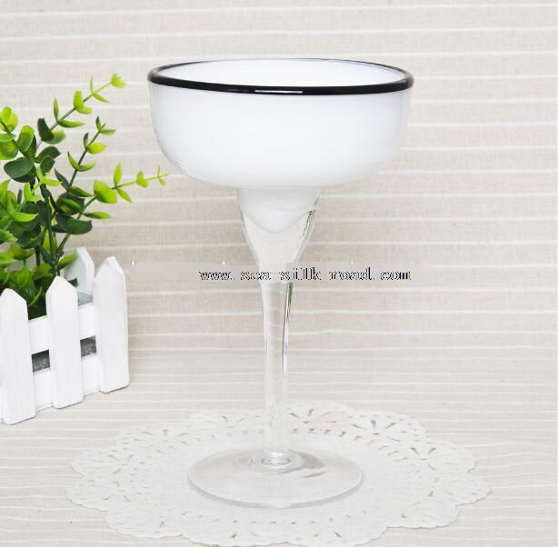white margarita glass with clear stem and black rim