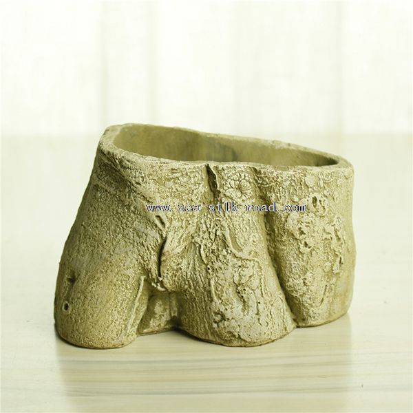 Different size cement tree stump flower pot