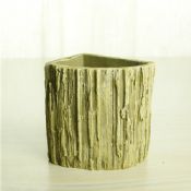 vasos de flores interior de tronco de árvore cimento images