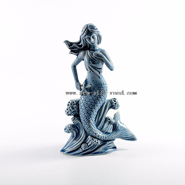 porcelain blue mermaid figurine