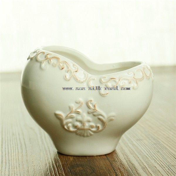 White ceramic glazed flower pot