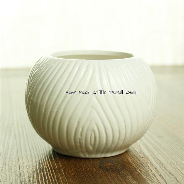 white round ceramic flower pot