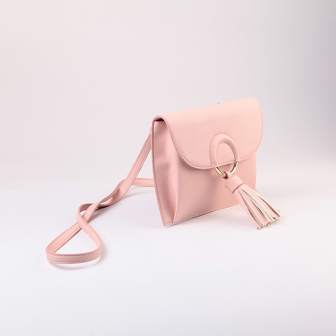 handbag with decorative tassel